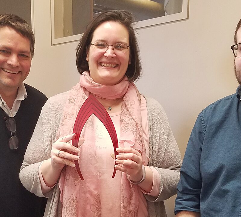 Photo of David Gordon, Mindy Johnson, and Nathan Trites with the 2017 NEPCo Award