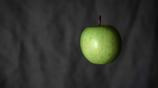 Photo of apple on black background