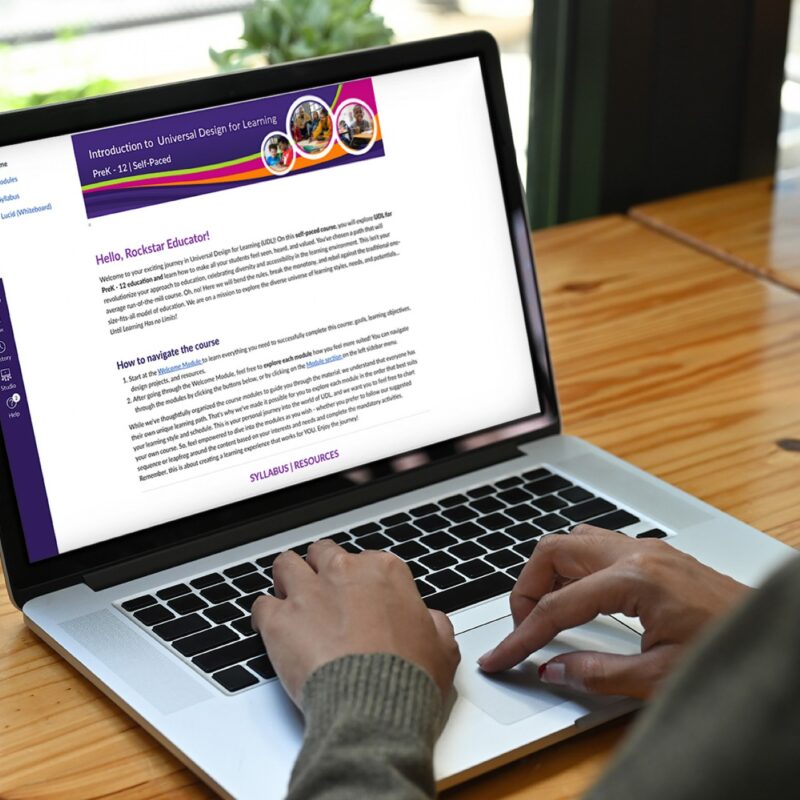 Photo of woman using laptop with a CAST Intro to UDL online course visible on the screen.