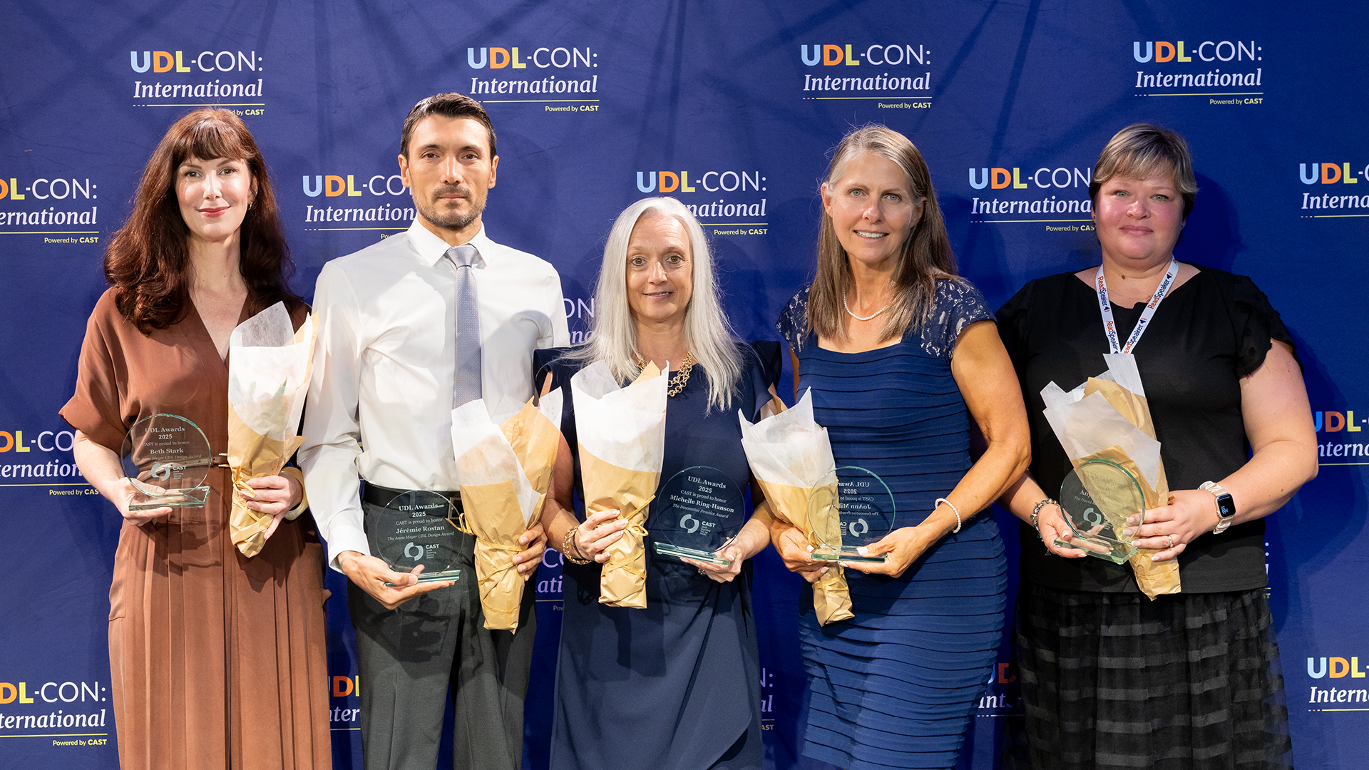 group photo of 2024 UDL Award recipients Beth Stark, Jérémie Rostan, JoAnn Miller, Michelle Ring-Hanson, and Dr. Anya Evmenova