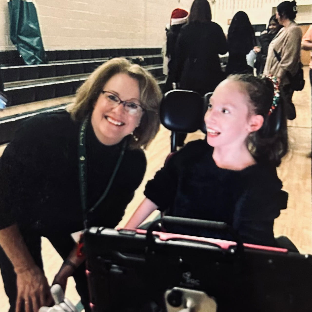 Laila and Heidi posing together at a school event